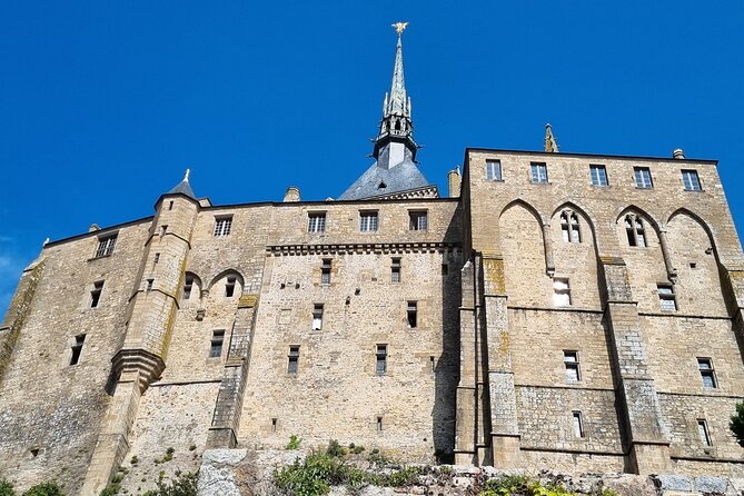 2 hour guided tour of Mont Saint Michel, abbey ticket included - Tides, the Dam, and the Bay Ecosystem: The Stories That Click