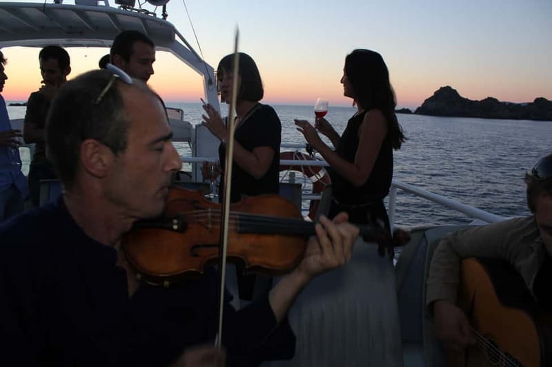 Ajaccio/Porticcio: Sanguinaires Sunset Cruise & Wine Tasting - How the Evening Runs: French-Led Guidance, Guided Stops, Live Music