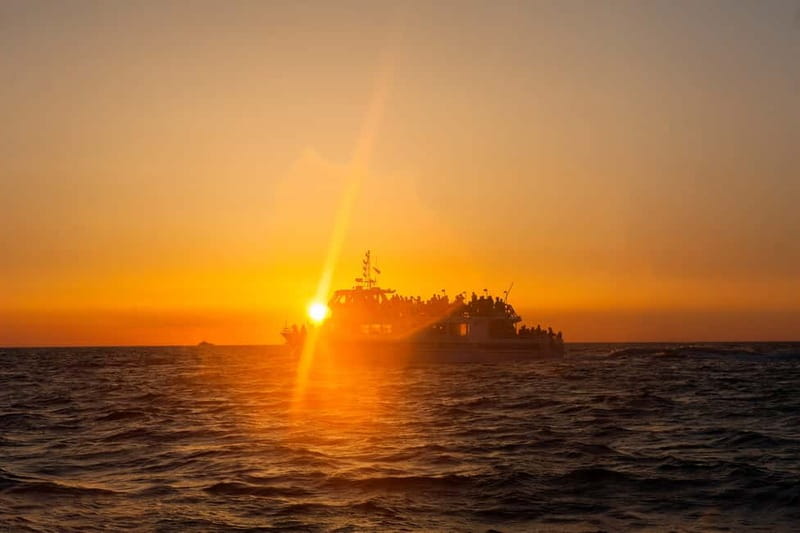 Ajaccio/Porticcio: Sanguinaires Sunset Cruise & Wine Tasting - Corsican Food, Songs, and the On-Board Party Energy