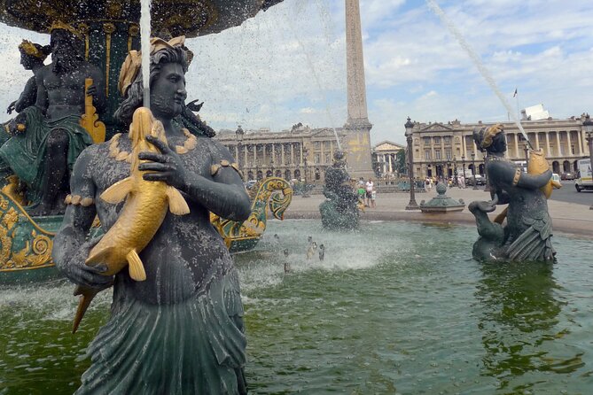 Arc de Triomphe and the Champs-Elysees Discovery Private Tour - Walking the Champs-Elysées toward Place de la Concorde