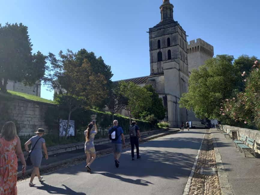 Avignon: City Walking Tour with Popes Palace Entry - Climbing to the palace: bring good shoes and plan your energy