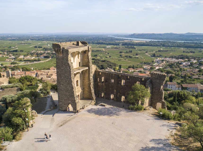 Avignon: Full-Day Châteauneuf du Pape Wines & Luberon Tour - Roussillon ochre cliffs: the color stop that feels like a paint box