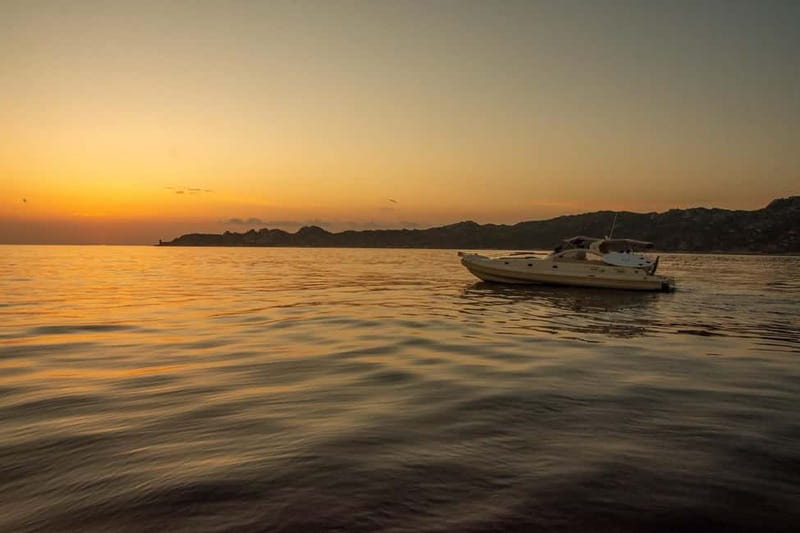 Bonifacio: Sunset Aperitif Dining Boat Tour - The Calanque of Fazzio swim: turquoise water and a real break from the street