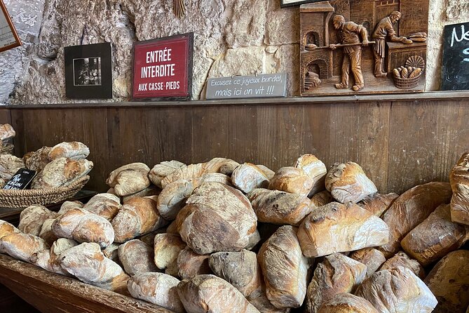 Bordeaux Old Town Food and Wine Tour - Grosse Cloche area tastings: bakery, fromagerie, butcher, and canelés