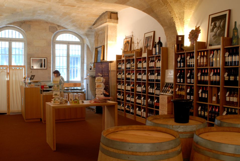 Bordeaux: Wine and Trade Museum Entry Ticket & Wine Tasting - The vaulted cellars and barrels: where Bordeaux wine learns to age