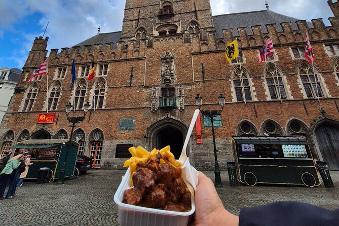 Bruges Guided Day Tour from Paris with Canal Cruise - Markt Square and the Belfry: Where the Street Scene Comes Alive