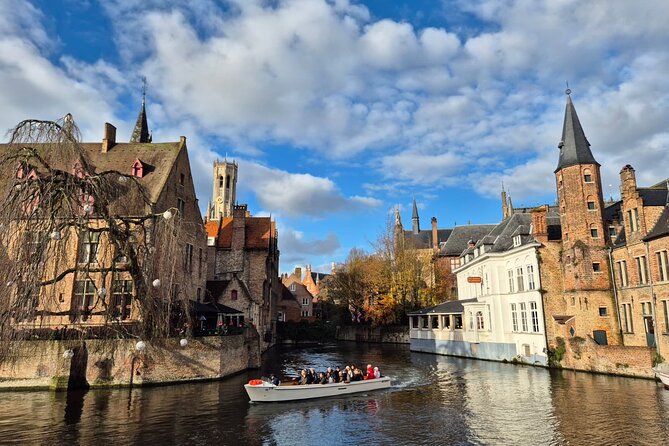 Bruges Guided Day Tour from Paris with Canal Cruise - Canal Cruise Views at Bruges Art Route: April–November vs Winter Town Hall