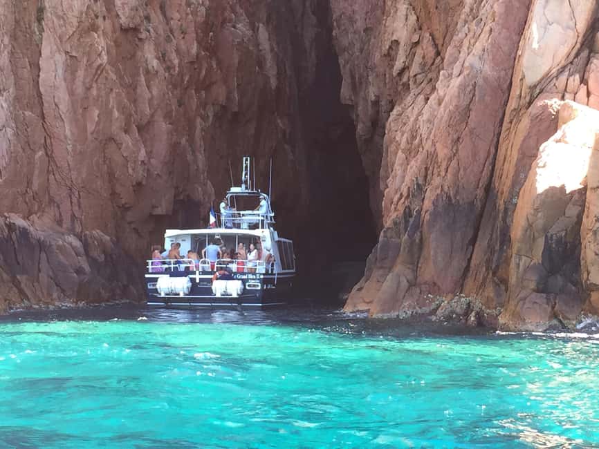 Cargèse: Scandola, Girolata, and Piana Afternoon Boat Tour - Capo Rosso: the caves, the arch, and that monastic-seal blue