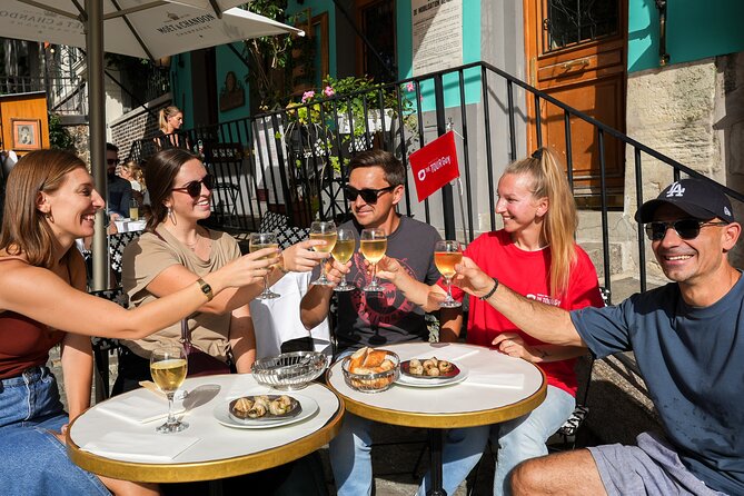Champagne & Oysters Paris Food Tour - Stop 1: Le Marais walking tour that sets up the food plan