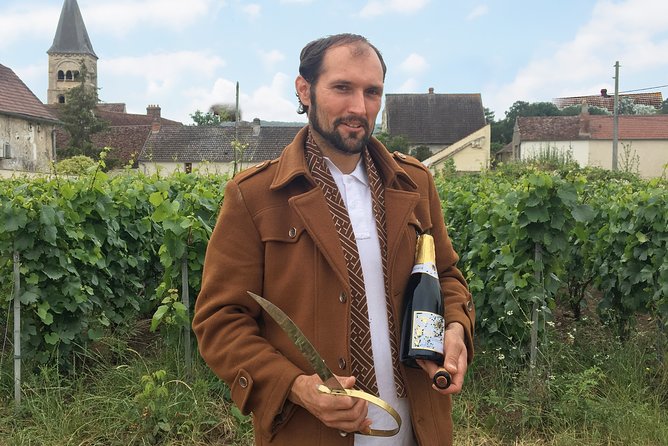 Champagne Sabrage & Tasting - Champagne PIERRE Laurent - A sabre, a bottle, and a vineyard in Saulchery