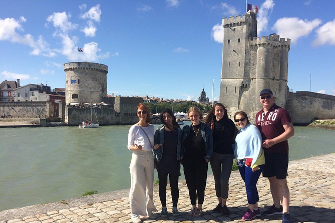 Discover La Rochelle: Discovery Walking Tour of La Rochelle - Old city walls and Gross Horloge: civic power in stone