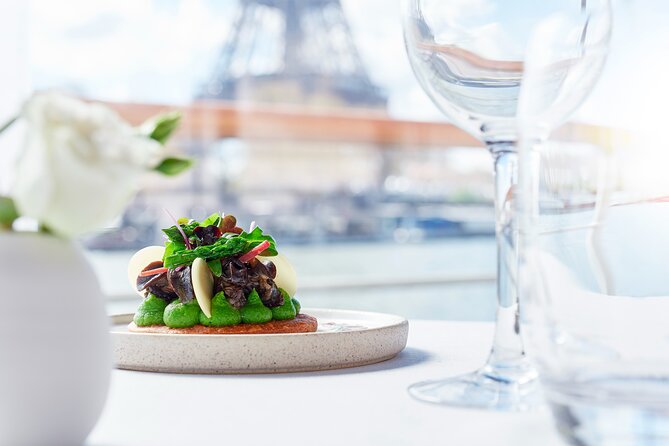 Early evening Dinner Cruise with drinks by Bateaux Parisiens - The Royal and Revolutionary Moments: Conciergerie, Louvre Views, and Place de la Concorde