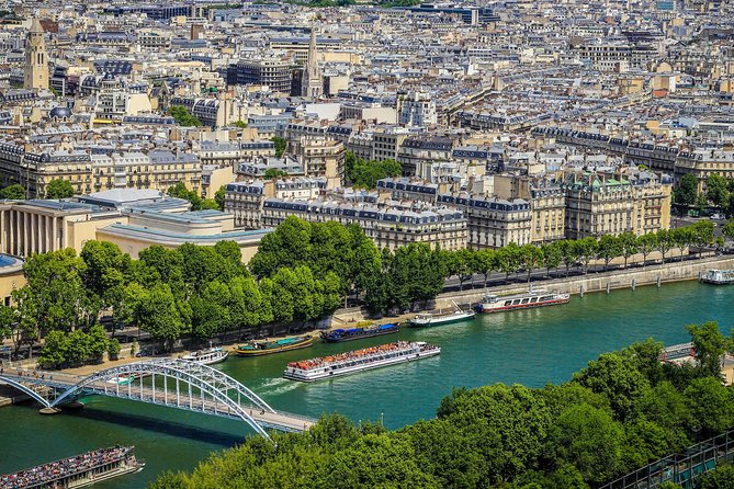 Eiffel Tower Elevator Tour with Optional Summit & Cruise Access - Stop 1 at the base: the Dame de Fer story before you even look up