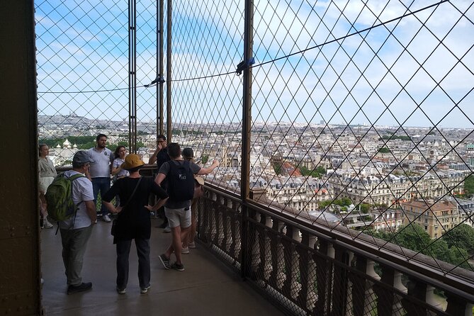 Eiffel Tower Guided Tour by the Stairs up to Second Floor - Weather, cancellation, and planning details