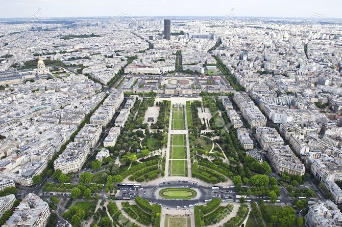 Eiffel Tower Tour by Stairs with Optional Summit by Lift - Stop 1 at the Eiffel Tower: guided climbing to the second floor