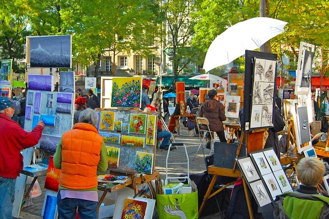 ESSENTIAL MONTMARTRE Walking Tour: the essential highlights+MORE! - Vigne du Clos Montmartre and the last-windmill story at Le Moulin de la Galette