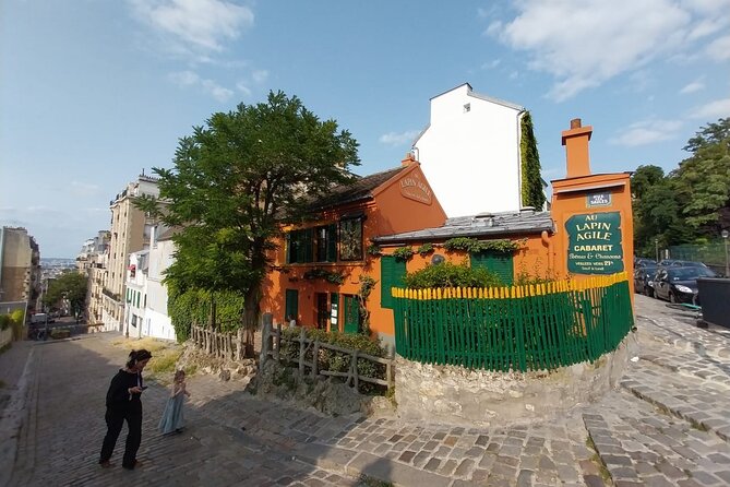 ESSENTIAL MONTMARTRE Walking Tour: the essential highlights+MORE! - Passe-Muraille, Le Lapin Agile, and Montmartre’s humor