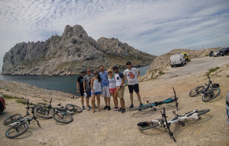 From Marseille: Calanques National Park E-Mountain Bike Tour - Calanque de Sormiou from Col de Cortiou: the view worth the grind