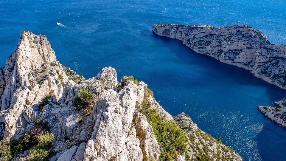 From Marseille: Calanques National Park Guided Hike - Guide-led breaks: flora, fauna, and Marseille-Calanques stories