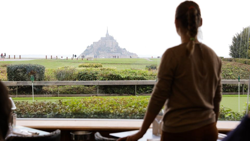 From Paris: 2-Day Normandy & Brittany Tour - Mont Saint-Michel: abbey visit, UNESCO status, and the stairs reality