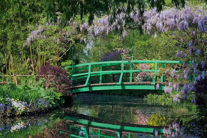 From Paris: discovery of Monet's house and its gardens in Giverny - The water lily pond and famous Japanese bridge