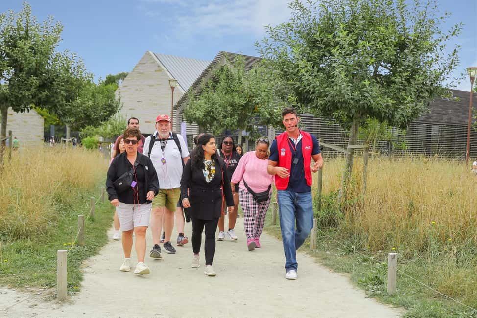 From Paris: Full-Day Mont Saint-Michel Guided Tour - Getting From Parking to the Island: Shuttles, a Wood Bridge, and Time Reality