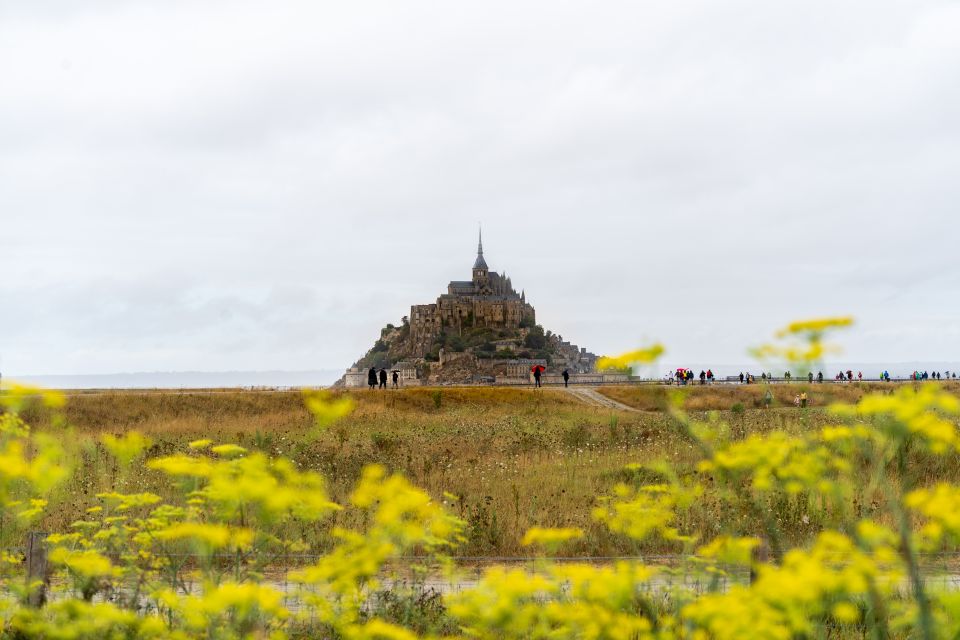 From Paris: Mont Saint Michel Day Trip with a Guide - Abbey of Mont Saint Michel: Audio Guide for Your Pace
