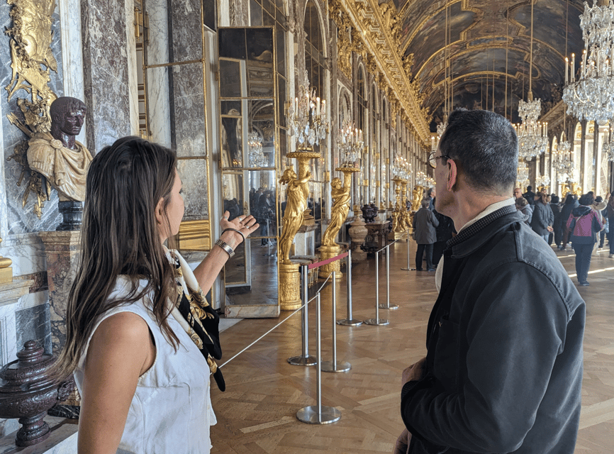 From Paris: Versailles Palace & Garden with Golf Cart - Entering through the Royal Courtyard