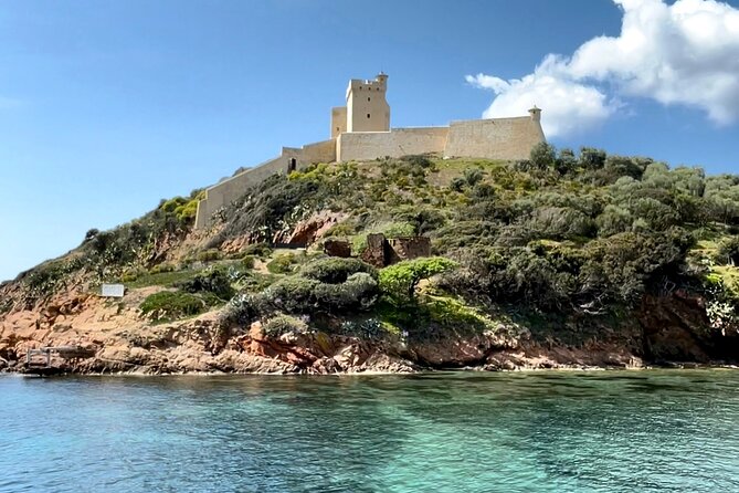 From Sagone/Cargèse: Scandola Girolata Calanques Piana Snorkeling - The Genoese Tower of Omigna in Cargèse: pirate-era defense