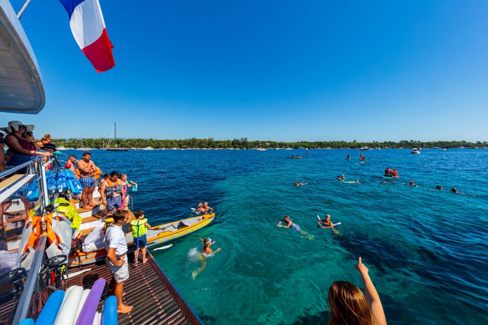 Full-Day Catamaran Cruise Departing from Cannes - Lérins Islands swim stop: masks on, time in the water