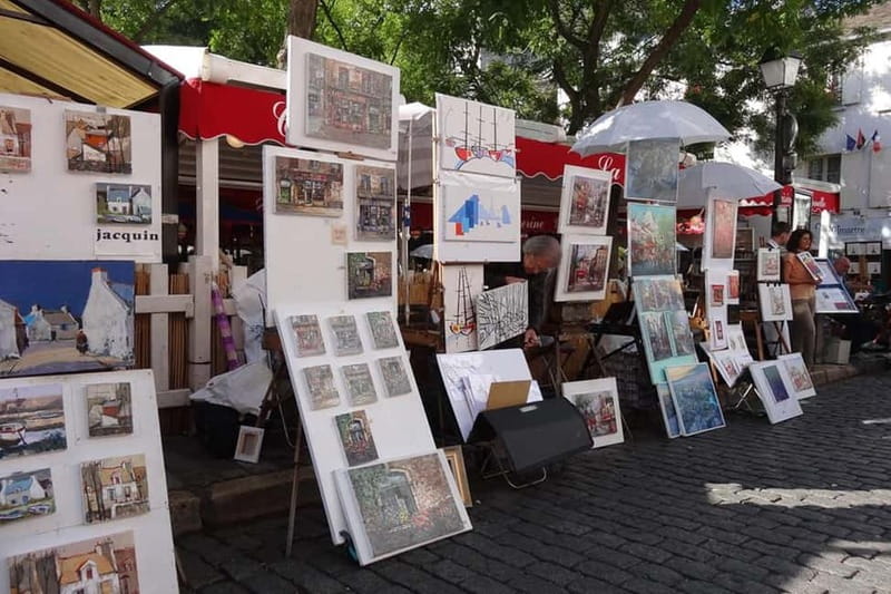 German private Walking Tour through Montmartre & Passages - Montmartre off the main routes: quieter streets, same magic