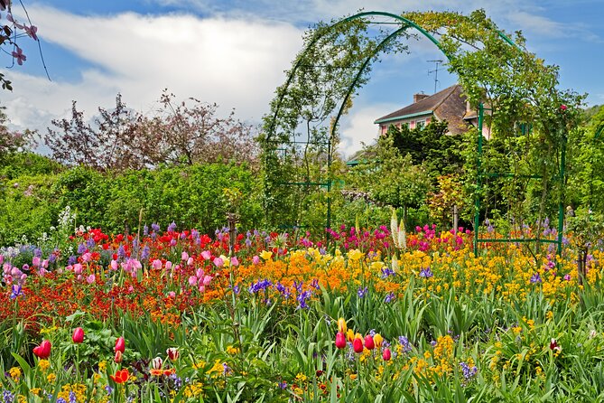 Giverny Monet’s Home and Gardens Half Day Tour from Paris - Giverny village free time: shops, cafés, and Monet’s tombstone