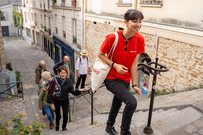 Hidden Montmartre: Paris' Secret Streets Walking Tour - Le Moulin de la Galette: Windmills, Expensive Streets, and a Secret Passage