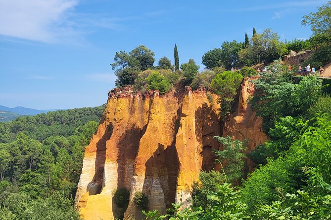 Highlights of Provence in one day - Gordes hill-town views: white stone spiraling around a rock (Stop 2)