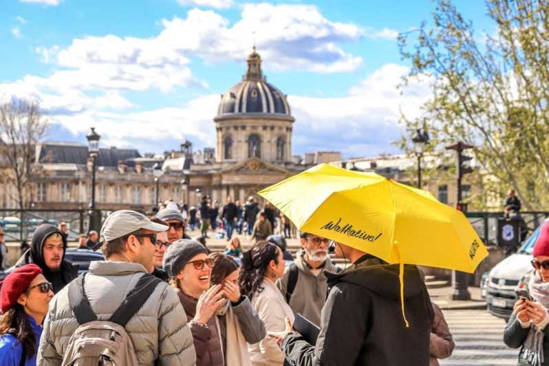 Historic Paris Walking Tour in English - The modern city reading Pont des Arts along the Seine