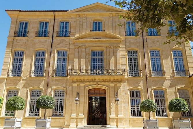 History and Renewal in Aix-en-Provence: A Self-Guided Audio Tour - Place des Quatre-Dauphins and the King René statue