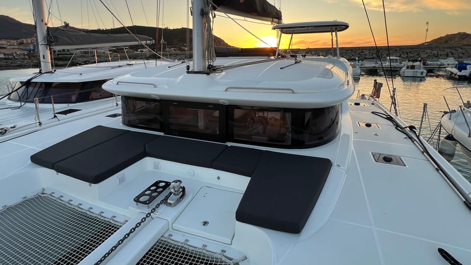 L'Île-Rousse, Corsica Catamaran Excursion: A Day in the Agriates Desert - Swim breaks with shared gear and the ladder reality check