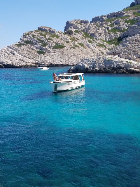 Marseille: Calanques Eco Boat Cruise with Lunch and Wine - Les Goudes to Île Maïre: Quick Stops That Break Up the Day