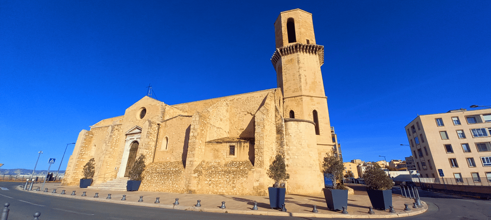 Marseille: Essential Guided Walking Tour of the City - Vieux Port and the forts: boats, trade, and WWII shadows
