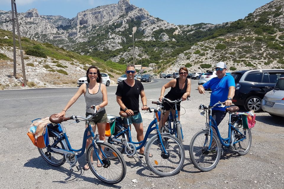 Marseille: Full-Day Guided E-Bike Coast & Calanques Tour - Riding out of Marseille: from Pharo Palace to the Vallon of Auffes