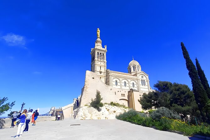 Marseille Guided Tour for 4 Hours with a Bilingual Local Guide - Abbaye Saint-Victor: a quieter, Romanesque pause near the water