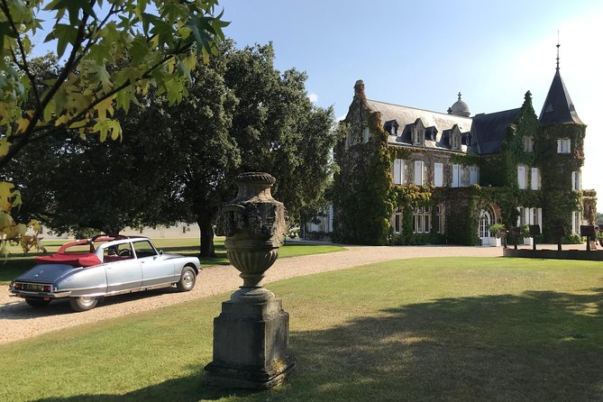 Médoc luxury wine tour aboard a Citroën DS Limousine Convertible - Lunch, Champagne, and Canelés Add-Ons