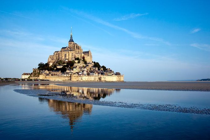 Mont Saint-Michel Day Trip from Paris with Abbey Ticket - Fortifications du Mont-Saint-Michel: understand the tides from the ramparts
