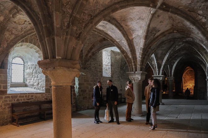 Mont Saint Michel Day Trip with Abbey Entrance from Paris - Abbaye du Mont-Saint-Michel: the climb, the copper Michael, and the key interiors