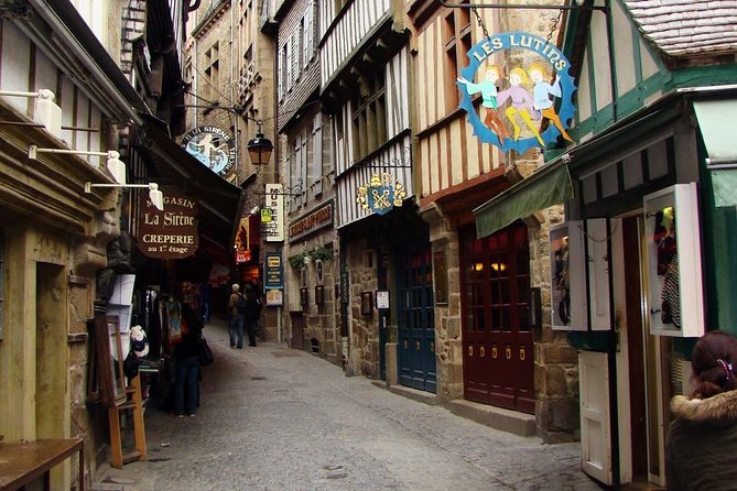 Mont Saint Michel Experience - Shuttle Service from Bayeux - Walking the Mont: steps, uneven footing, and wind on open stone