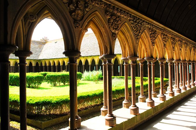 Mont Saint Michel Guided Day Trip with Hotel Pickup - Climbing into the Benedictine Abbey