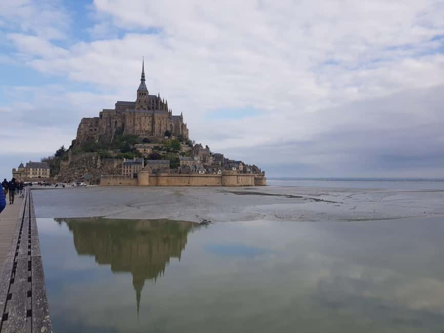 Mont Saint Michel: Village History and Legends Walking Tour - Where You Meet and How the Bridge vs Shuttle Decision Works