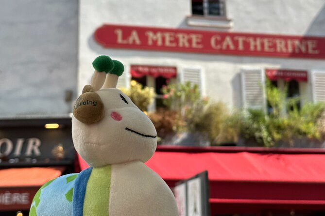 Montmartre - A Canvas of Art and History (Self-Guided audio tour) - Musée de Montmartre and the bright pink building