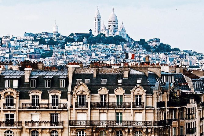 Montmartre District and Sacre Coeur - Exclusive Guided Walking Tour - Place du Tertre, Bateau-Lavoir, and Dali-related stops: art made physical