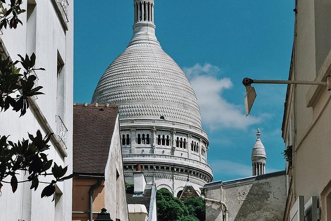 Montmartre District and Sacre Coeur - Exclusive Guided Walking Tour - Jardin Sauvage, Clos Montmartre, and Le Lapin Agile: the hillside detours that feel special